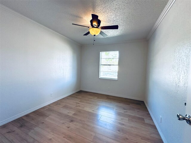 1317 N Mary St, Comanche, TX 76442 - dining area with a textured wall, a chandelier, a textured ceiling, arched walkways, and light wood-style floors
