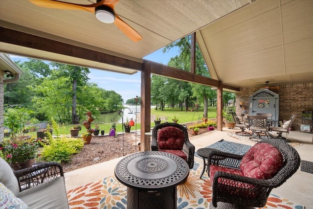view of patio with ceiling fan and outdoor dining space