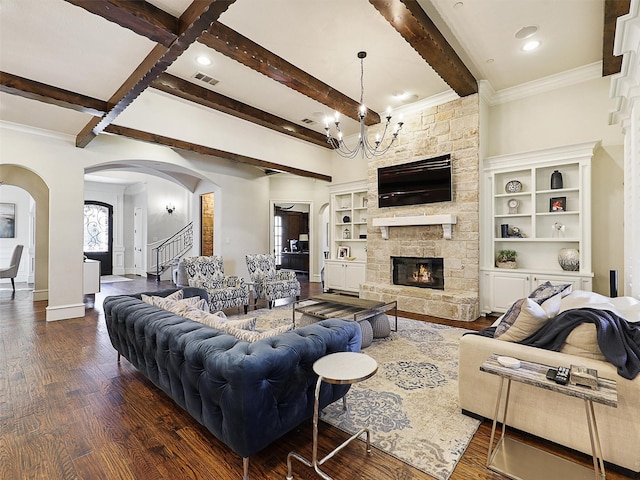 living room featuring arched walkways, visible vents, dark wood-type flooring, and beamed ceiling