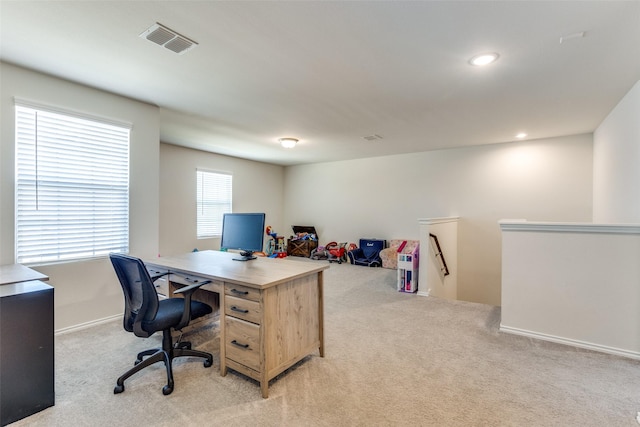 office area with visible vents, recessed lighting, and light carpet