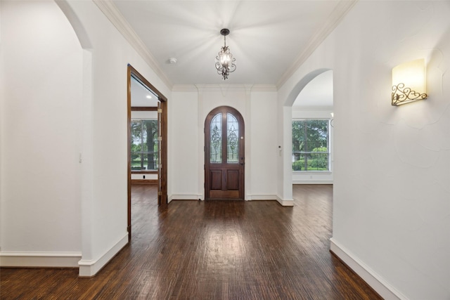 651 Countryside Dr, Fairview, TX 75069 - entryway with arched walkways, dark wood-style flooring, baseboards, crown molding, and a chandelier