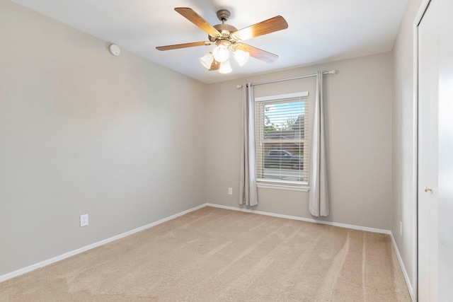 4248 Ireland Dr, The Colony, TX 75056 - unfurnished room featuring light colored carpet, baseboards, and a ceiling fan