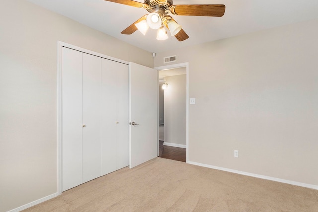 4248 Ireland Dr, The Colony, TX 75056 - unfurnished bedroom featuring visible vents, a closet, baseboards, and carpet floors