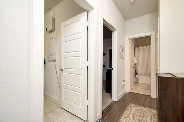7632 Parkview Dr, Watauga, TX 76148 - hallway with light wood-type flooring and baseboards