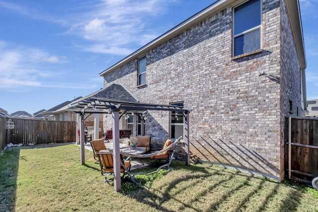 7632 Parkview Dr, Watauga, TX 76148 - rear view of house with brick siding and a patio area
