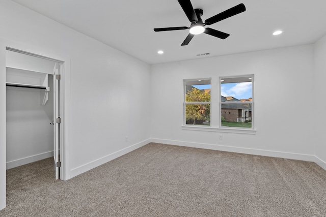 unfurnished bedroom featuring recessed lighting, carpet flooring, visible vents, and baseboards