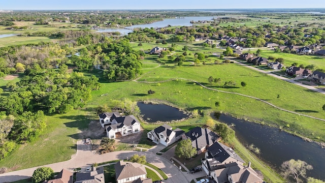 aerial view with a water view and a residential view