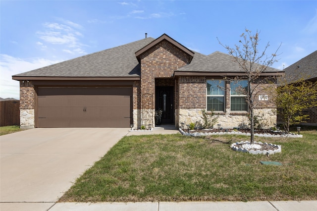 1703 Ratama Dr, Princeton, TX 75407 - french country style house with an attached garage, stone siding, driveway, and a shingled roof