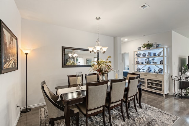 1703 Ratama Dr, Princeton, TX 75407 - dining room with dark wood-type flooring and a chandelier