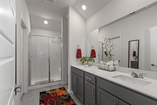 1703 Ratama Dr, Princeton, TX 75407 - bathroom featuring double vanity, a shower stall, tile patterned floors, and recessed lighting