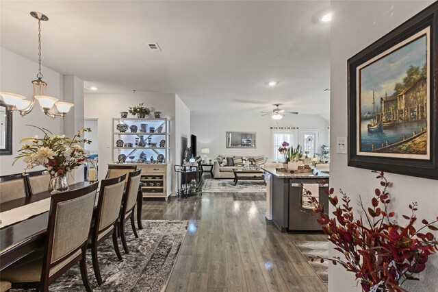 1703 Ratama Dr, Princeton, TX 75407 - dining space featuring dark wood finished floors, ceiling fan, a chandelier, and recessed lighting