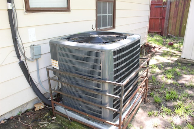 exterior details with fence and central AC