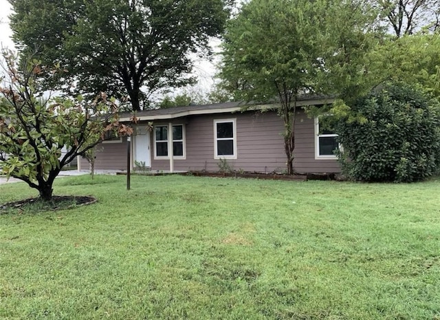exterior space with a front lawn