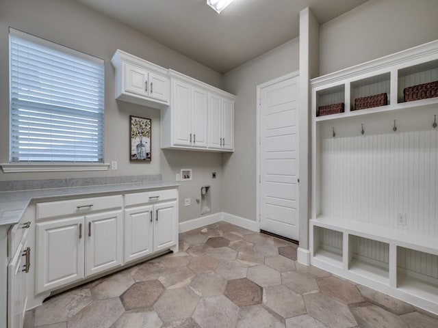 laundry area featuring cabinet space, electric dryer hookup, washer hookup, and gas dryer hookup