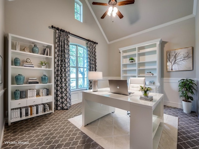 office area featuring crown molding, a healthy amount of sunlight, a ceiling fan, and light colored carpet