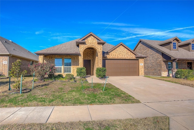 view of front of house with an attached garage, a shingled roof, brick siding, and concrete driveway