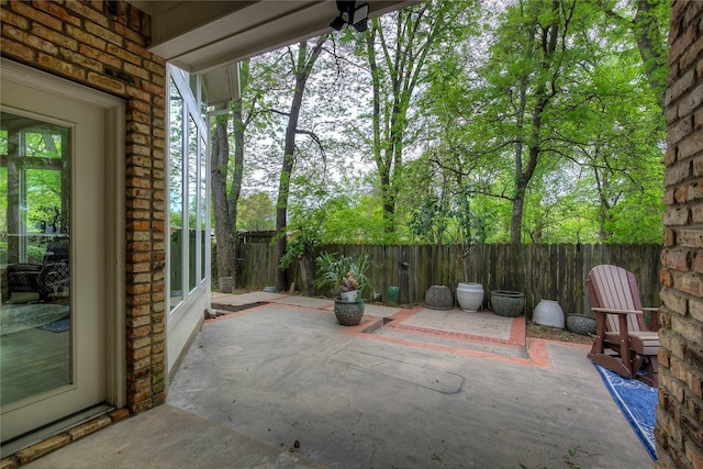 view of patio with fence
