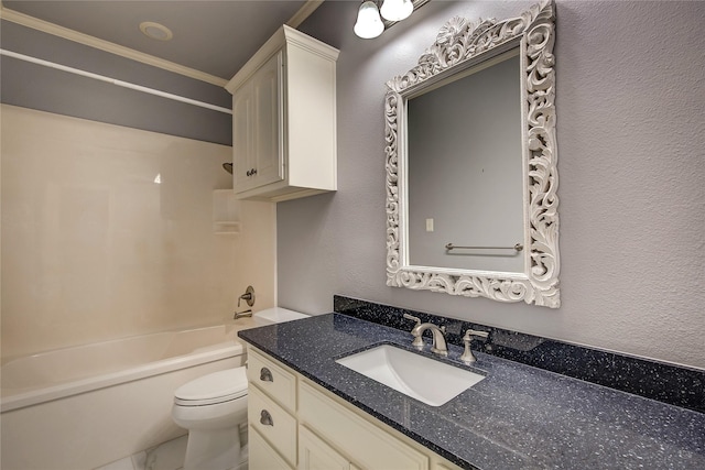 full bathroom with toilet, vanity, a textured wall, and tub / shower combination