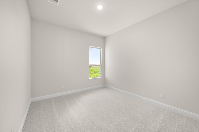 2413 Rams Horn, Waxahachie, TX 75167 - spare room with baseboards, visible vents, and light carpet