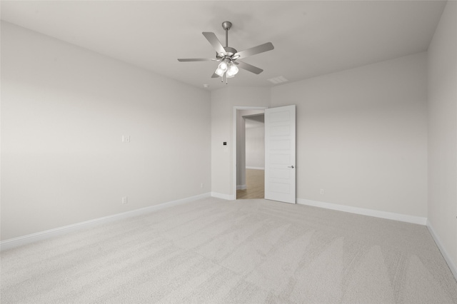 2413 Rams Horn, Waxahachie, TX 75167 - spare room featuring baseboards, light carpet, and ceiling fan