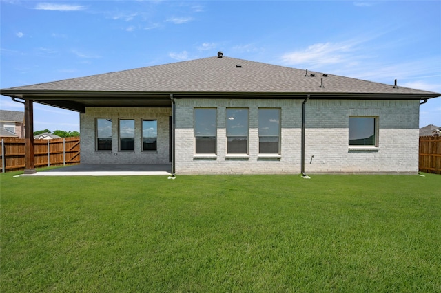 2413 Rams Horn, Waxahachie, TX 75167 - rear view of property with a shingled roof, a yard, a patio, and a fenced backyard