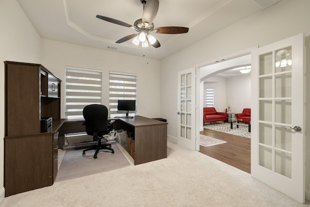 14662 Gentle Breeze Rd, Frisco, TX 75035 - office featuring french doors, carpet floors, visible vents, a healthy amount of sunlight, and arched walkways