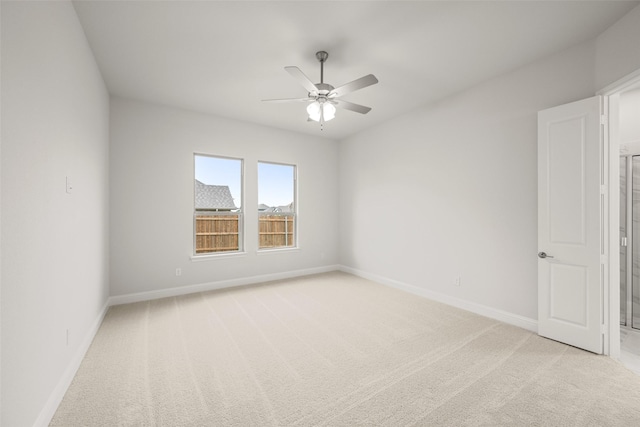 2297 High Plain Ln, Waxahachie, TX 75167 - spare room with a ceiling fan, baseboards, and light colored carpet
