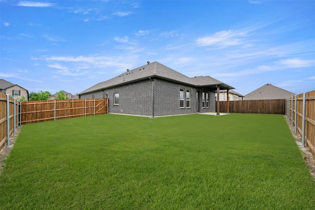 2297 High Plain Ln, Waxahachie, TX 75167 - back of house featuring roof with shingles and brick siding