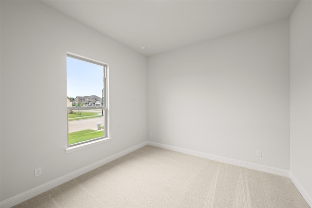 2297 High Plain Ln, Waxahachie, TX 75167 - spare room with light colored carpet, plenty of natural light, and baseboards