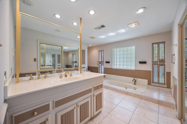 full bathroom with vanity, recessed lighting, tile patterned floors, visible vents, and a garden tub