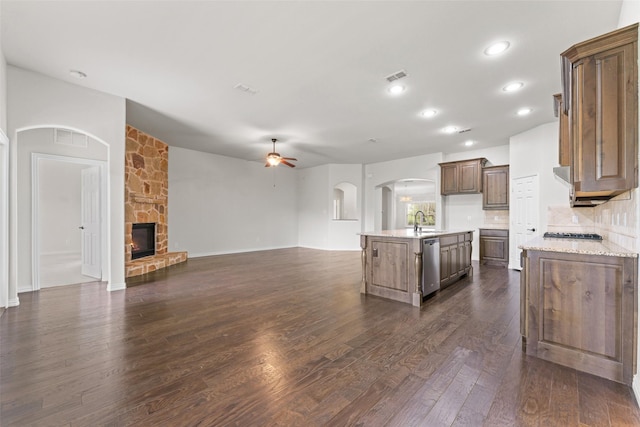 109 Joplin Dr, Mckinney, TX 75071 - kitchen with visible vents, a sink, open floor plan, a ceiling fan, and stainless steel dishwasher