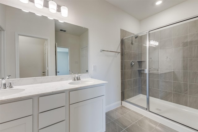 4050 Bedford Dr, Crandall, TX 75114 - full bathroom featuring visible vents, a stall shower, and a sink