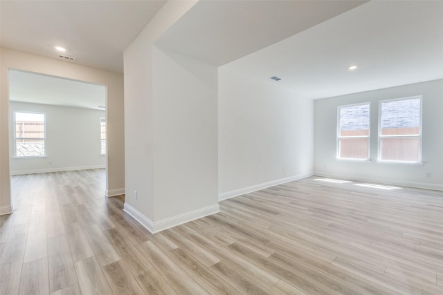 4050 Bedford Dr, Crandall, TX 75114 - unfurnished room with light wood finished floors, baseboards, visible vents, and recessed lighting