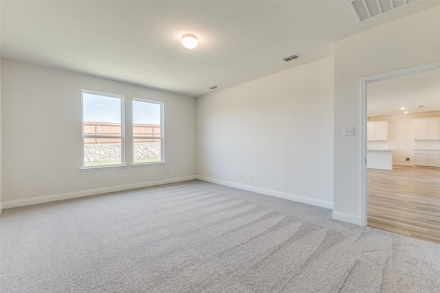 4050 Bedford Dr, Crandall, TX 75114 - empty room with baseboards, visible vents, and carpet floors