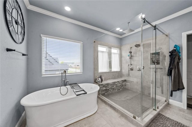 10281 Creekside Ln, Waco, TX 76712 - bathroom featuring a stall shower, ornamental molding, a freestanding tub, baseboards, and recessed lighting