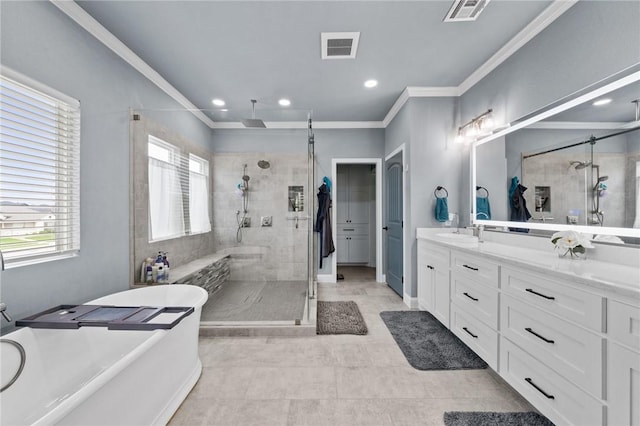 10281 Creekside Ln, Waco, TX 76712 - full bathroom with a shower stall, healthy amount of natural light, a freestanding tub, double vanity, and crown molding