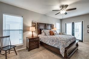 carpeted bedroom featuring baseboards