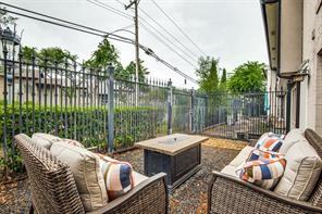 view of patio / terrace featuring an outdoor hangout area and fence