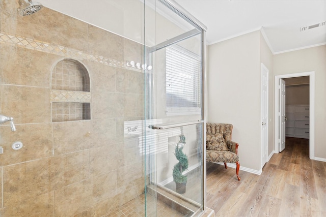 110 Harvest Bend Dr, Wylie, TX 75098 - full bathroom with crown molding, a shower stall, wood finished floors, and baseboards
