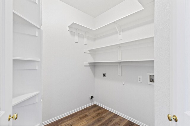 110 Harvest Bend Dr, Wylie, TX 75098 - laundry area featuring hookup for an electric dryer, gas dryer hookup, baseboards, washer hookup, and dark wood-type flooring