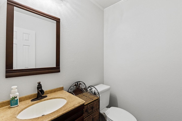 110 Harvest Bend Dr, Wylie, TX 75098 - half bathroom featuring ornamental molding, vanity, and toilet