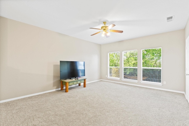 110 Harvest Bend Dr, Wylie, TX 75098 - unfurnished living room with a ceiling fan, carpet, and baseboards