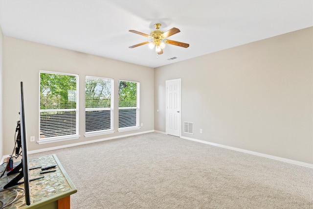 110 Harvest Bend Dr, Wylie, TX 75098 - unfurnished living room featuring a ceiling fan, carpet flooring, and baseboards
