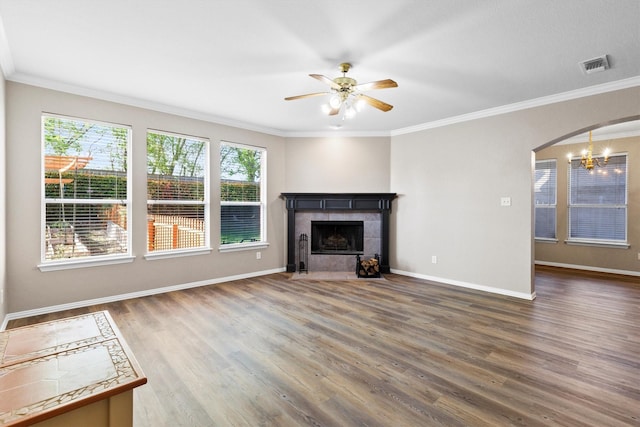 110 Harvest Bend Dr, Wylie, TX 75098 - unfurnished living room with ornamental molding, stairway, light wood-style floors, ceiling fan, and a fireplace