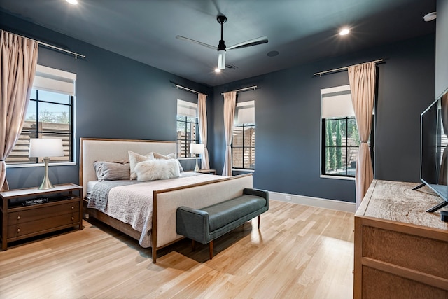 7158 Pasadena Ave, Dallas, TX 75214 - living area featuring recessed lighting, light wood-style floors, plenty of natural light, stairway, and arched walkways