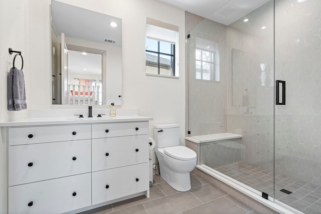 7158 Pasadena Ave, Dallas, TX 75214 - bathroom featuring speckle patterned floor, toilet, vanity, and shower / washtub combination