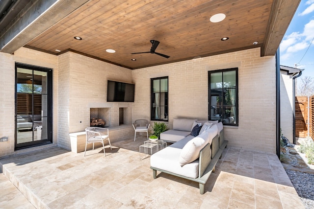 7158 Pasadena Ave, Dallas, TX 75214 - view of patio with an outdoor living space with a fireplace