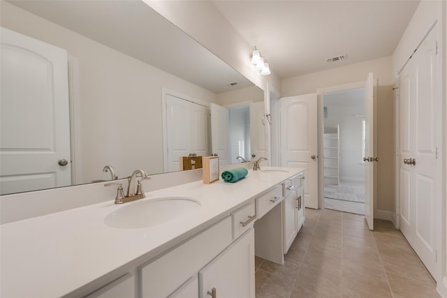 1108 Silverthorn Trl, Justin, TX 76247 - full bathroom featuring double vanity and tile patterned flooring