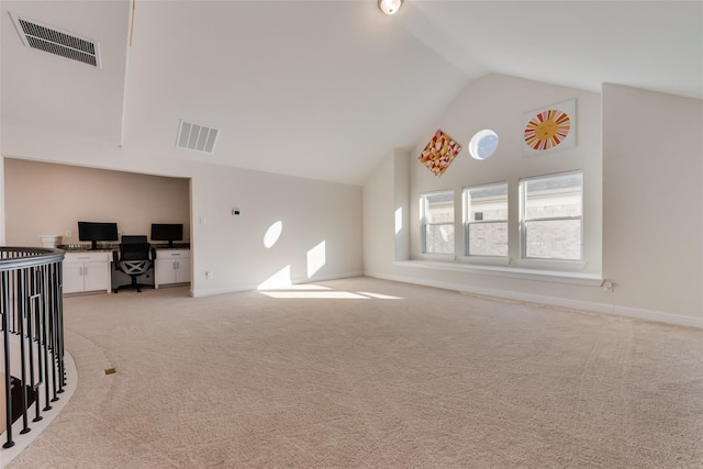 1108 Silverthorn Trl, Justin, TX 76247 - living room with light colored carpet, lofted ceiling, an office area, and baseboards