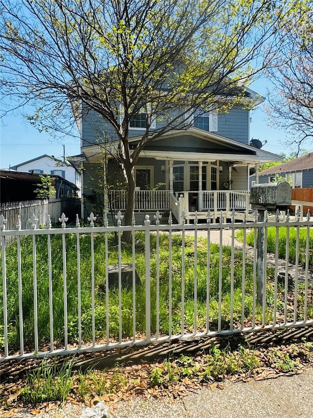 510 S Waverly Dr, Dallas, TX 75208 - view of front of property with a porch and a fenced front yard